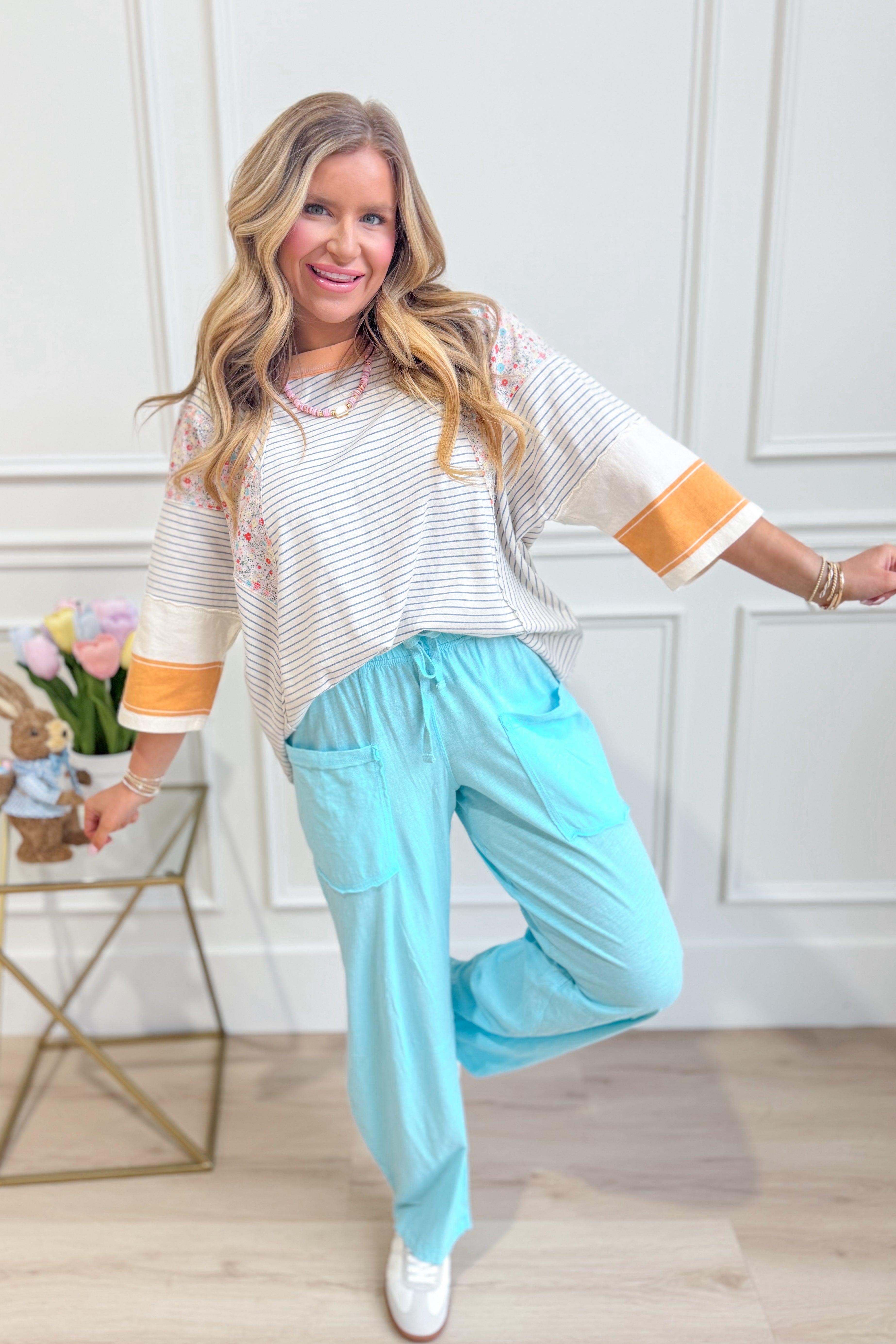 Relaxed fit Bella Cotton Barrel Pants by RAE MODE in natural cotton, shown in a casual style with a tapered leg design.