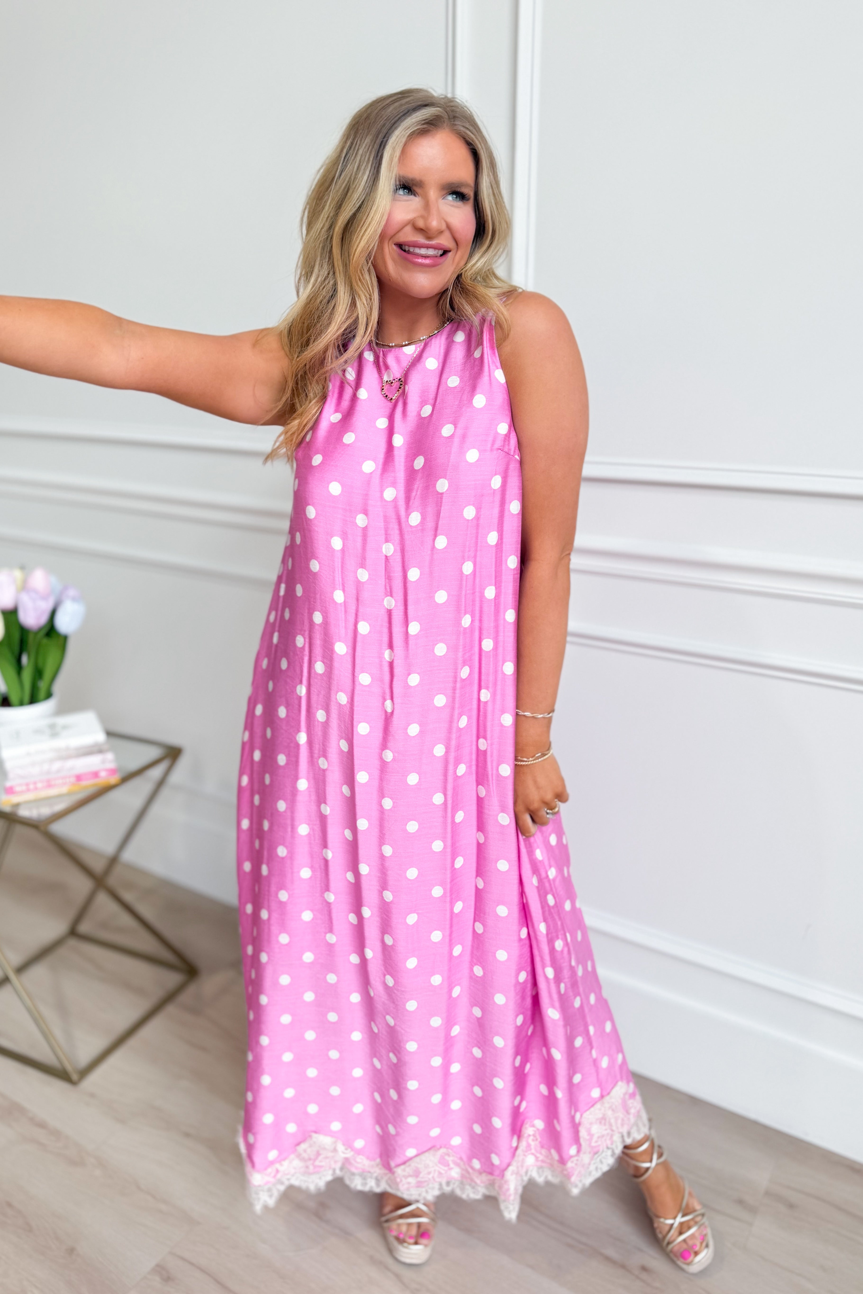 ENTRO Carrie Polka Dot Midi Dress with long sleeves, fitted waist, and stylish black and white polka dot pattern.
