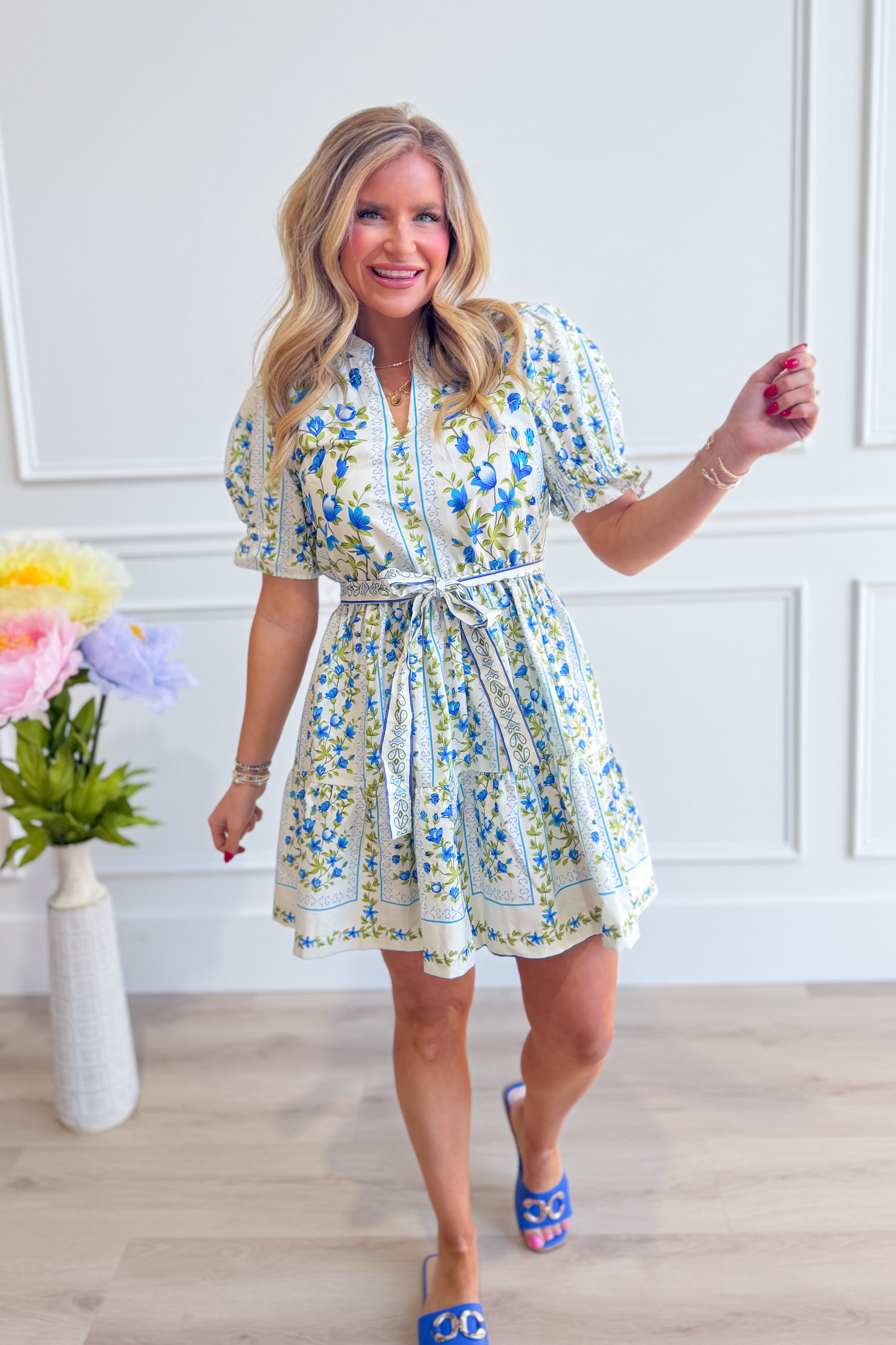 EE:SOME Bella floral printed tie waist dress, a stylish 125 dressy dress with vibrant floral pattern and tied waist design.