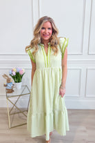 Lacy Flutter Sleeve Solid Trim Dress by ENTRO, featuring elegant flutter sleeves and a classic dressy design.