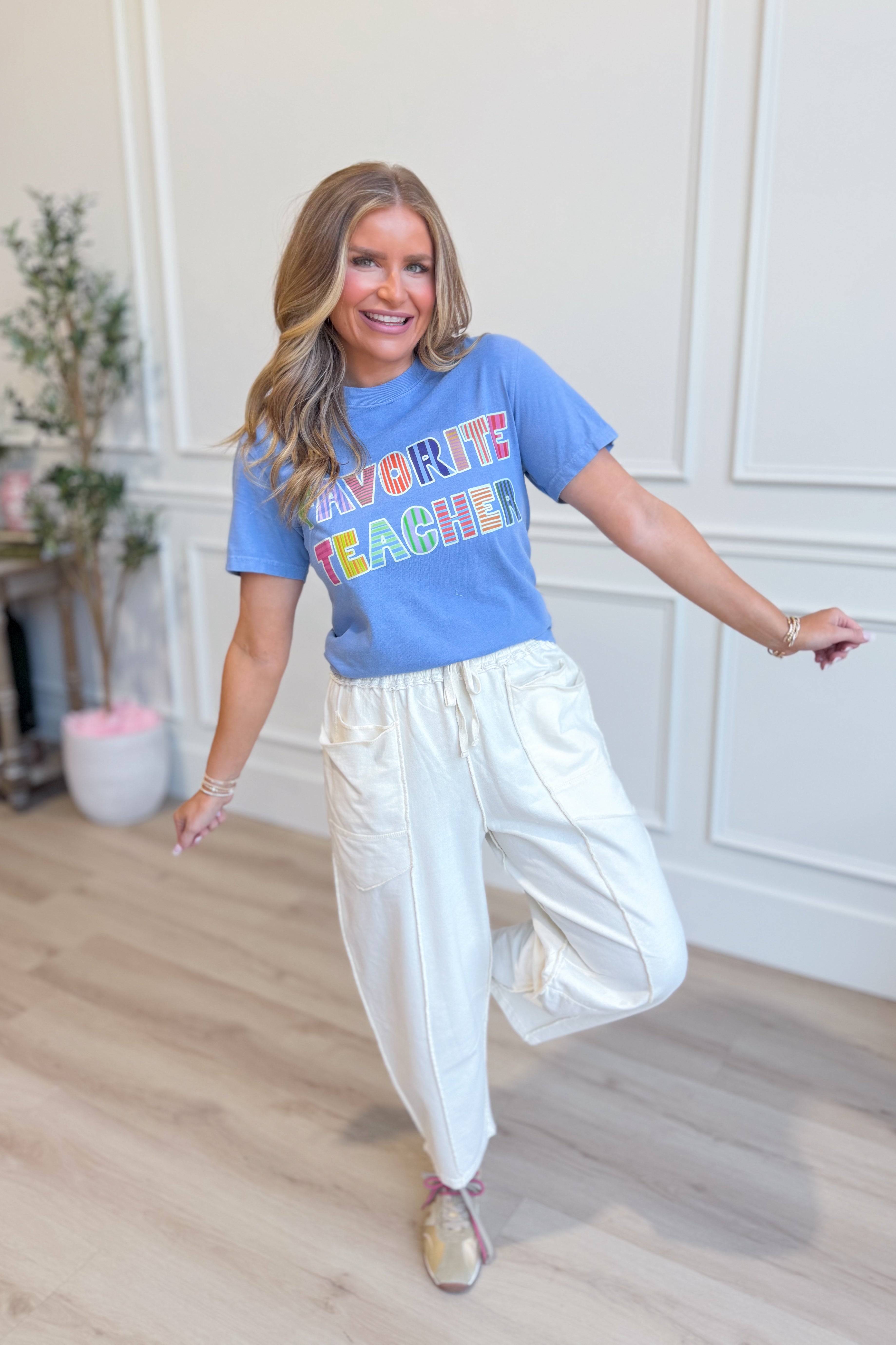 Favorite Teacher graphic T-shirt by ETTA & EAST, featuring a fun teacher-themed design on a casual graphic tee.