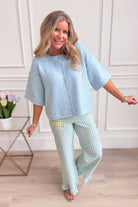 Baevely Lauren button-down cardigan top from 131 Spring Sweaters collection, featuring a soft knit fabric and button details.