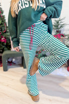 Rudy Green Striped Holiday Pant from BUCKET LIST, 156 pants featuring festive green and white stripes, casual holiday wear.