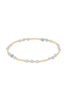 Enewton Aquamarine and gold Joy Gem bracelet featuring aquamarine stones and gold accents on a delicate jewelry design.