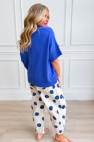 Collins Cobalt Blue solid casual sweater by SHE + SKY, featuring a comfortable knit design and classic crew neckline.