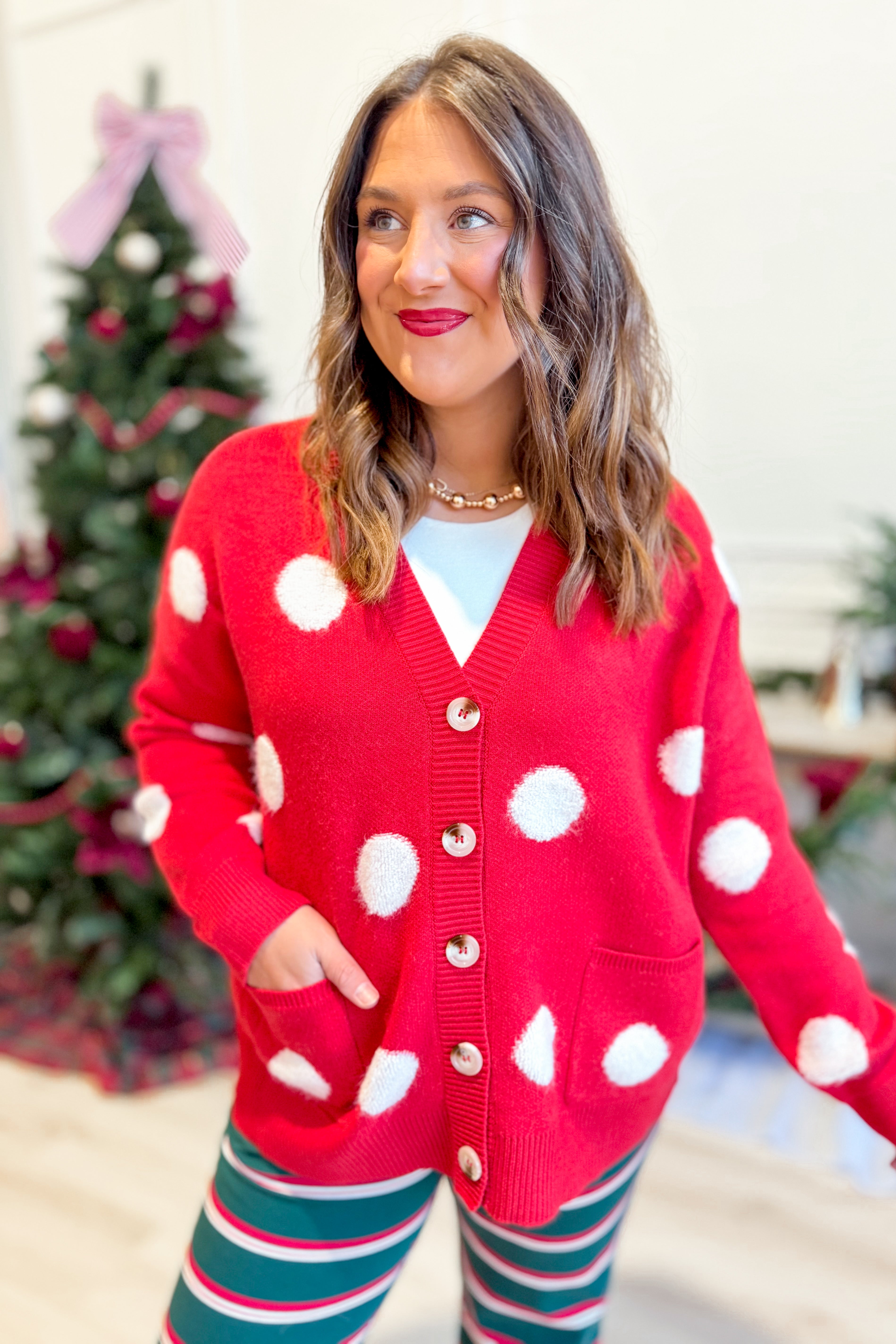 Red Saylor button-up cardigan from TWENTIFOURTH, styled as a fall sweater with a classic button-down design.