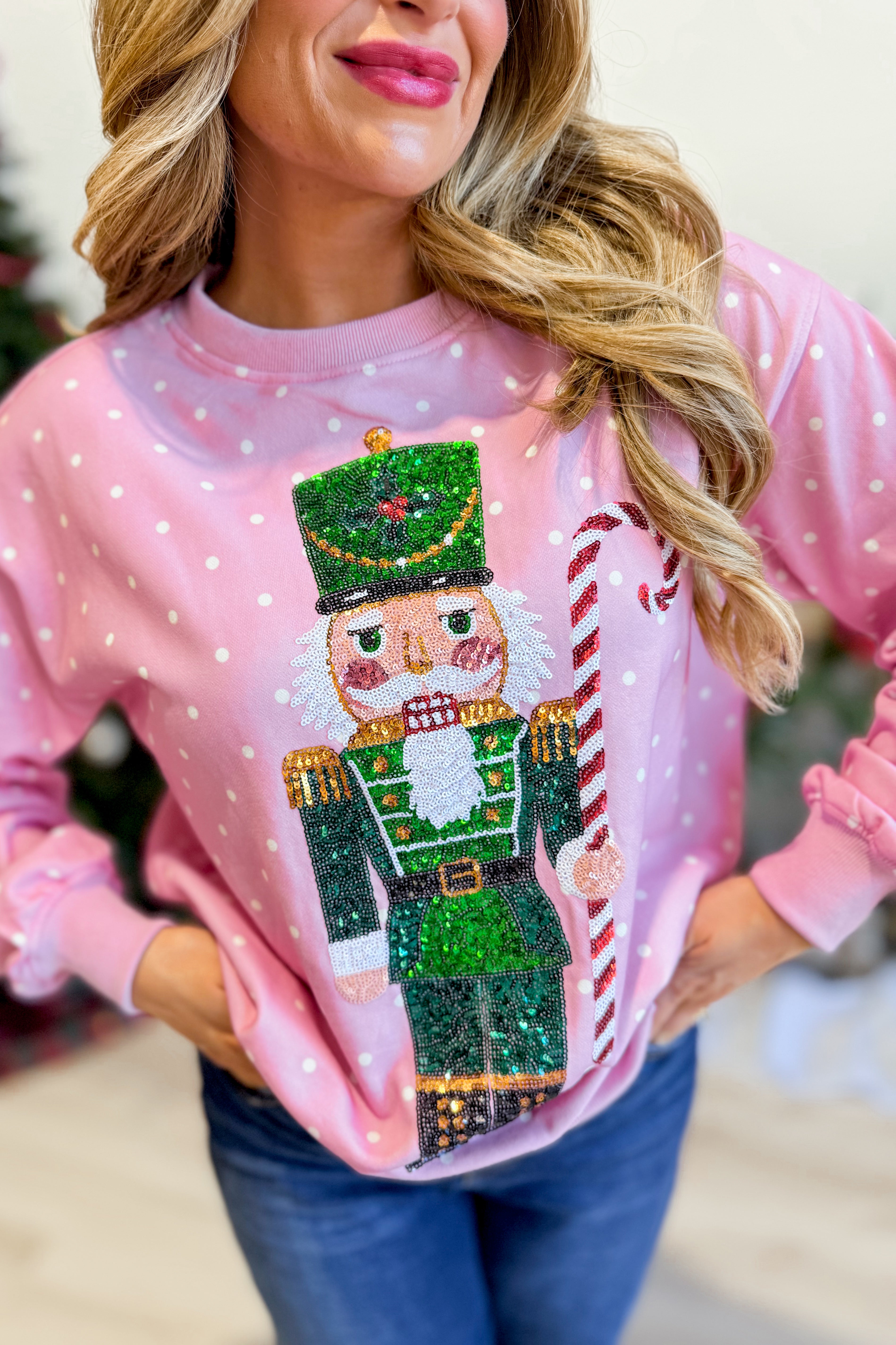 PEACH LOVE Minnie Nutcracker printed pullover sweatshirt with festive graphic design