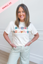 Raising Believers graphic t-shirt by Worthy Wear featuring bold design on a casual 117 Graphic Tees shirt.