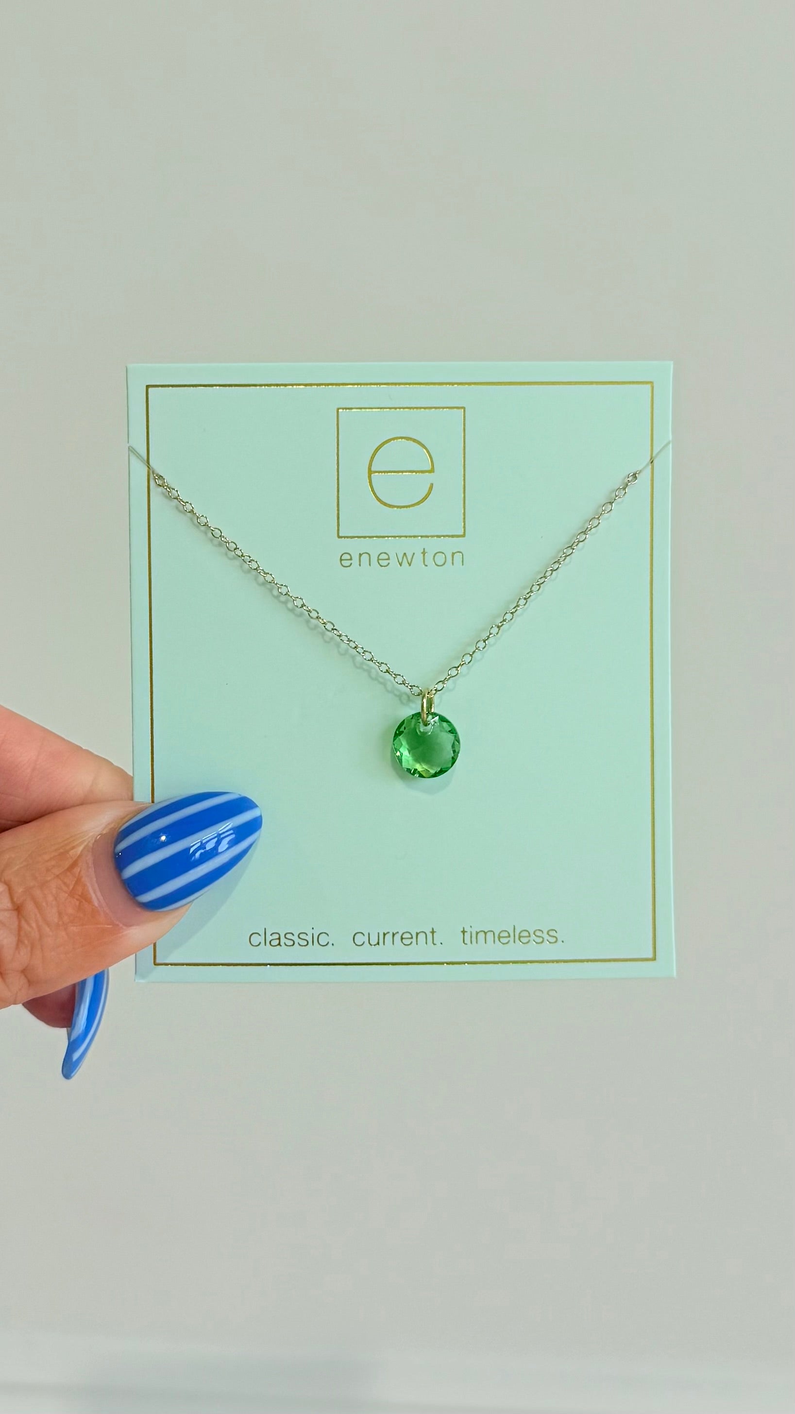 Enewton 16-inch classic birthstone necklace with a sparkling gemstone pendant on a silver chain.