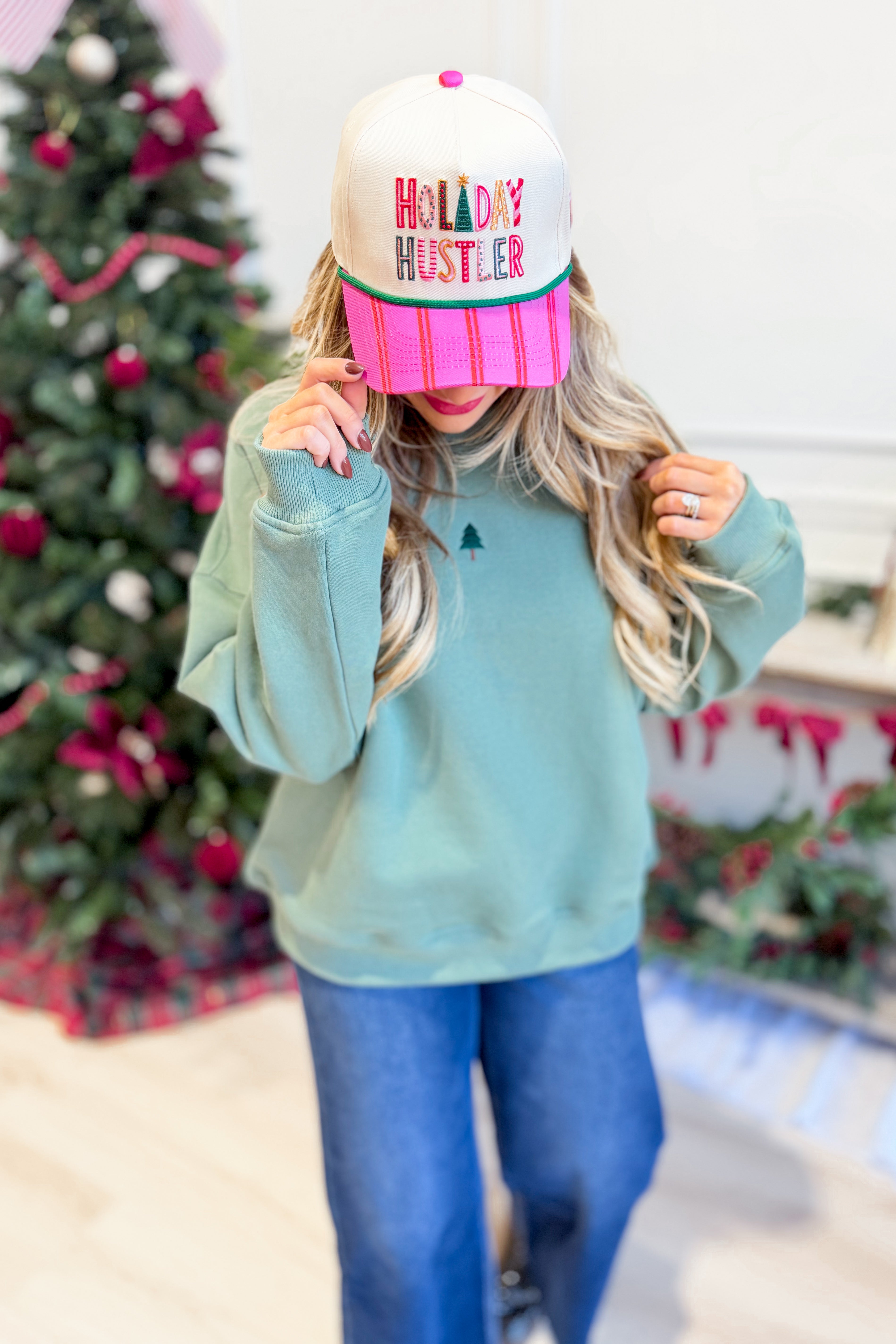 LE LIS Lynette Christmas Tree embroidered oversized sweatshirt featuring festive holiday design and graphic print.