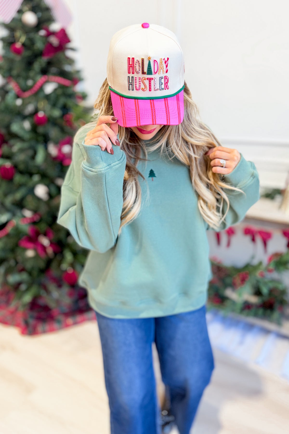 LE LIS Lynette Christmas Tree embroidered oversized sweatshirt featuring festive holiday design and graphic print.