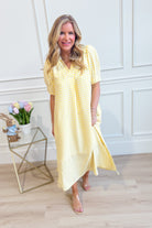 Umgée USA Tonya plaid printed midi dress featuring a stylish pattern and elegant fit, perfect for dressy occasions.