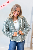 Baevly Xavier floral printed 140 outerwear jacket with colorful floral design and lightweight fabric, hanging on a hanger.