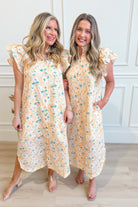 ENTRO Aubrey yellow floral flutter sleeve dress, 125 dressy dress with lightweight fabric and vibrant floral pattern, perfect for summer.