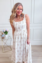 BLU PEPPER Addison floral sleeveless midi dress with a fitted bodice and flowy skirt, perfect for dressy occasions.