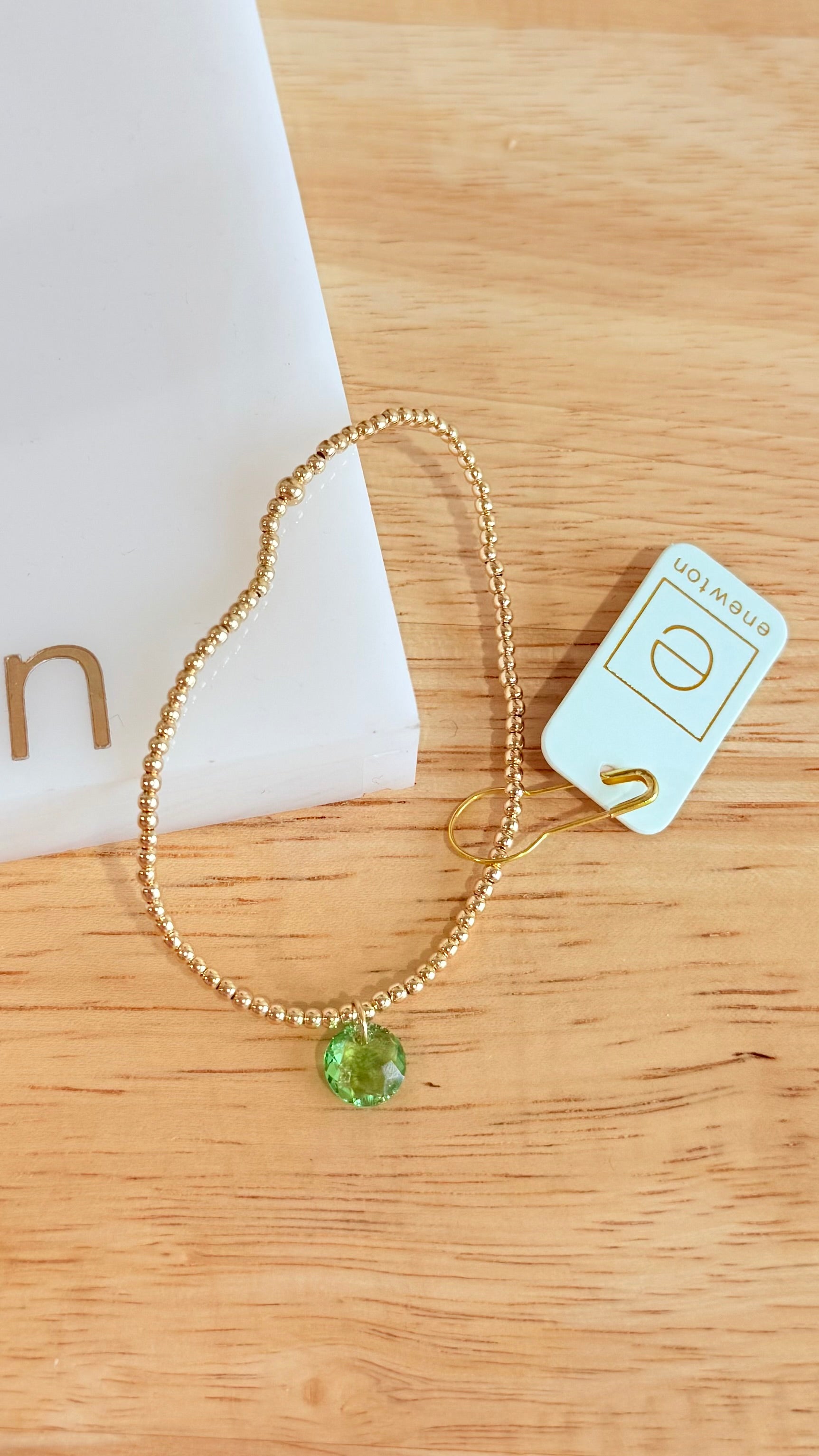 Enewton 2mm classic birthstone bracelet with colorful gemstone beads and silver clasp, stylish and elegant jewelry accessory.
