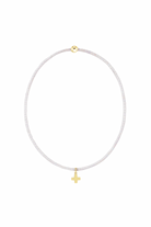 Enewton Silky White Hope classic signature cross charm bracelet with silver chain and cross pendant, stylish jewelry accessory.