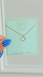 Enewton 16-inch classic birthstone necklace featuring a sparkling gemstone pendant on a silver chain.