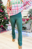 MONOB Turner Spruce Crossover Yoga Leggings, 158 model, featuring a sleek design and comfortable fit for active wear.