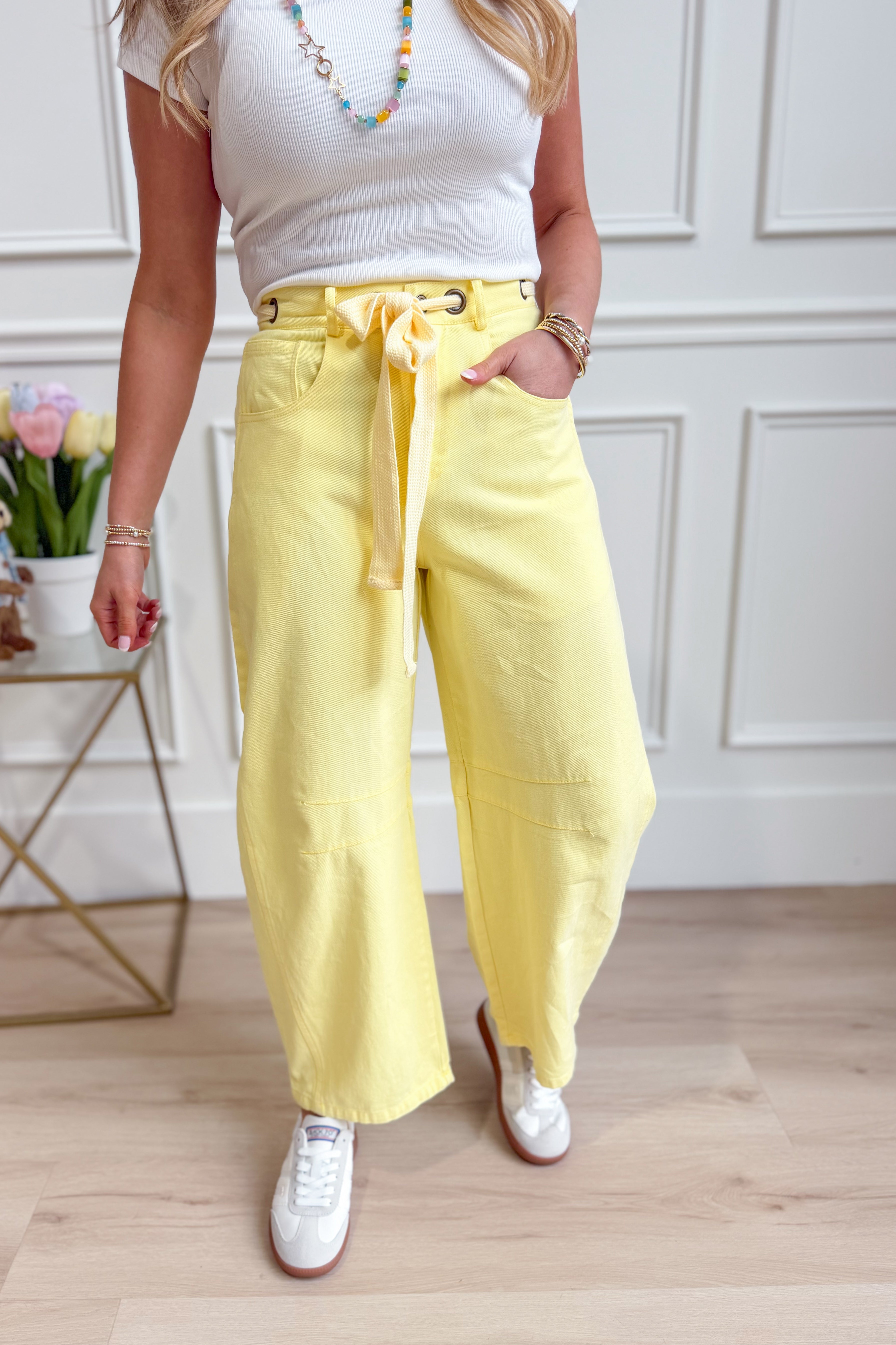 Light yellow mineral-washed PEACH LOVE Candice barrel jeans with eyelet details, 147 novelty denim style for casual wear.