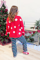 Red Saylor button-up cardigan from TWENTIFOURTH, styled with fall sweater details and a classic knit design.