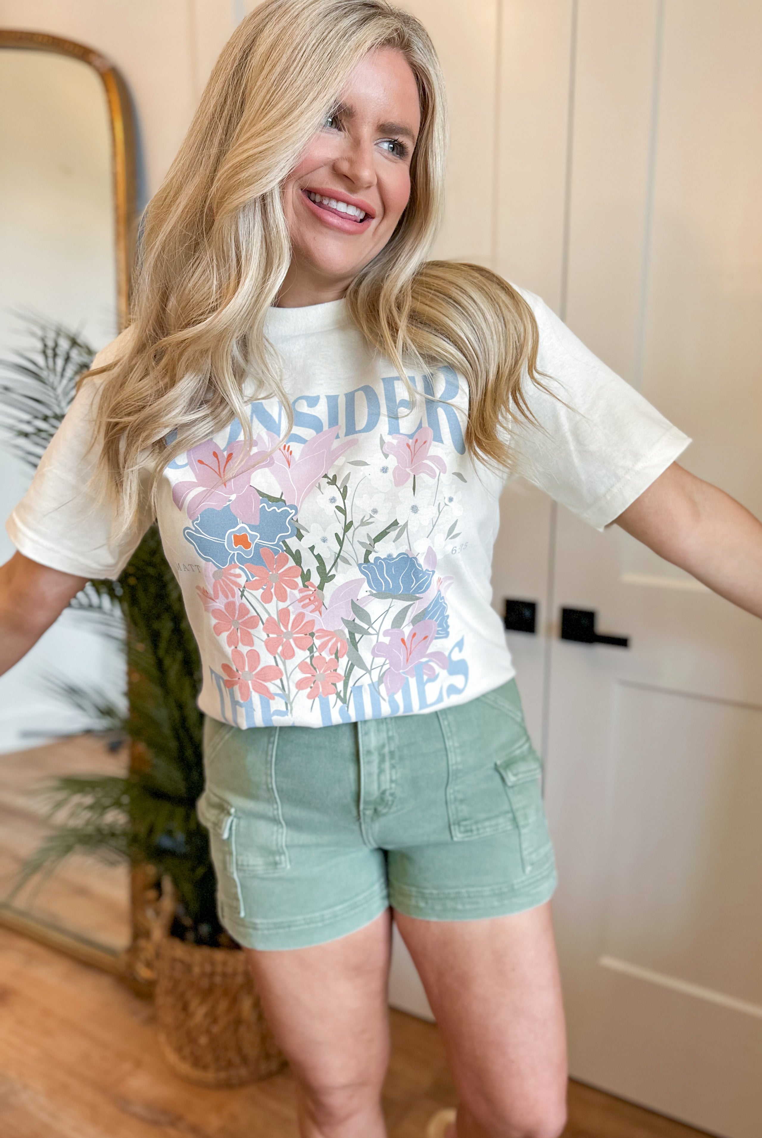 Consider The Lillies Round Neck Short Sleeve Graphic Tee - Be You Boutique