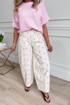 Pink polka dot Landry barrel jeans by PEACH LOVE, featuring a stylish 147 novelty jean design with a modern fit.
