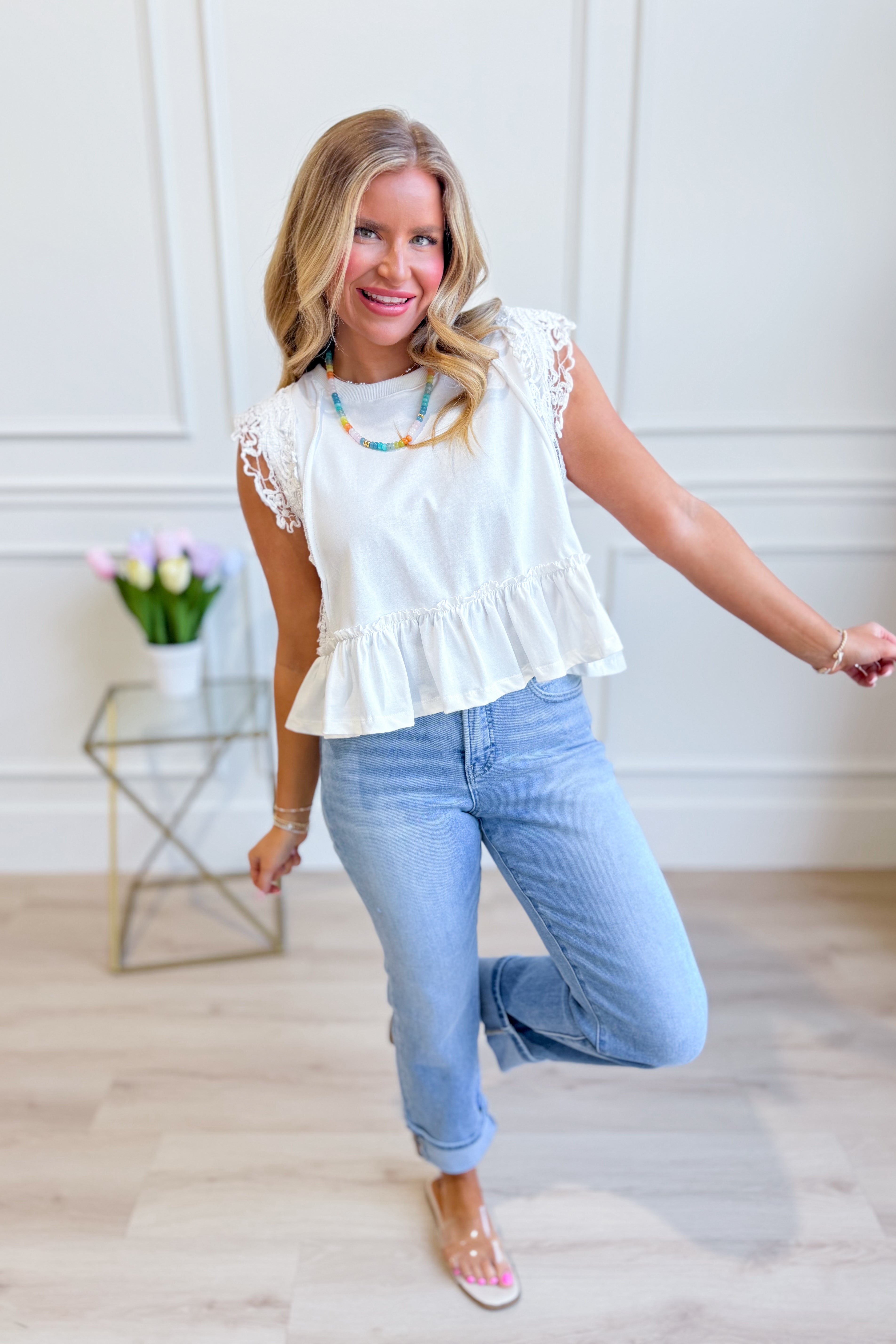 EE:SOME Tracey side lace trim ruffle top, casual fashion top with feminine lace detailing and ruffled accents.