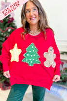 PEACH LOVE Tweed Christmas Patch Pullover Sweatshirt featuring festive patch designs on a cozy graphic sweatshirt.