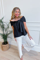 TCEC Oneita bow accented off-the-shoulder dressy top in black with bow detail and ruffled neckline, stylish and elegant for evening wear.