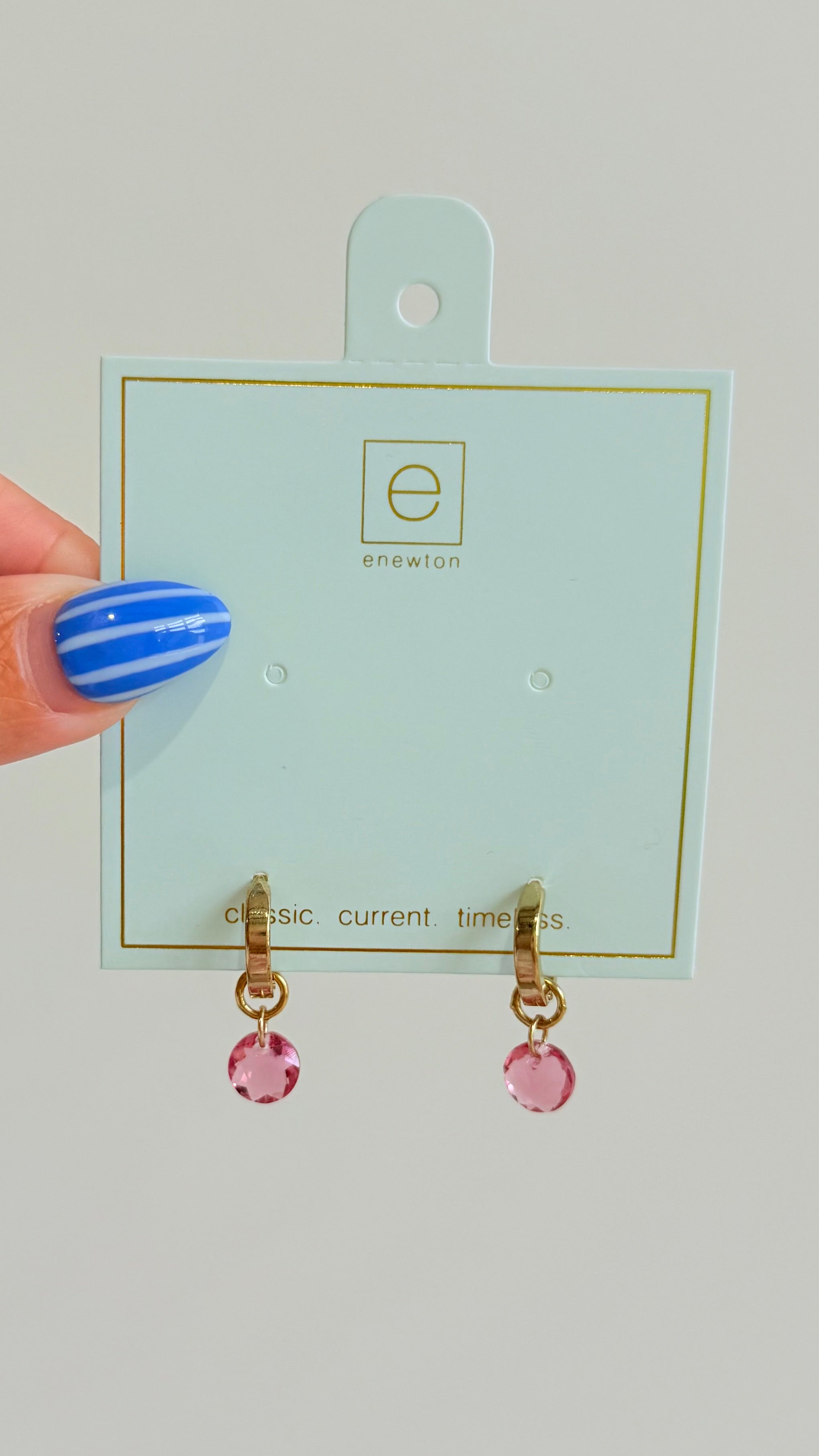Enewton .5mm Classic Birthstone Huggie earrings with colorful gemstones in 222 other jewelry style, close-up shot.