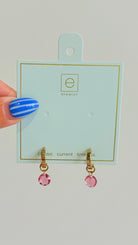 Enewton .5mm Classic Birthstone Huggie earrings with colorful gemstones in 222 other jewelry style, close-up shot.