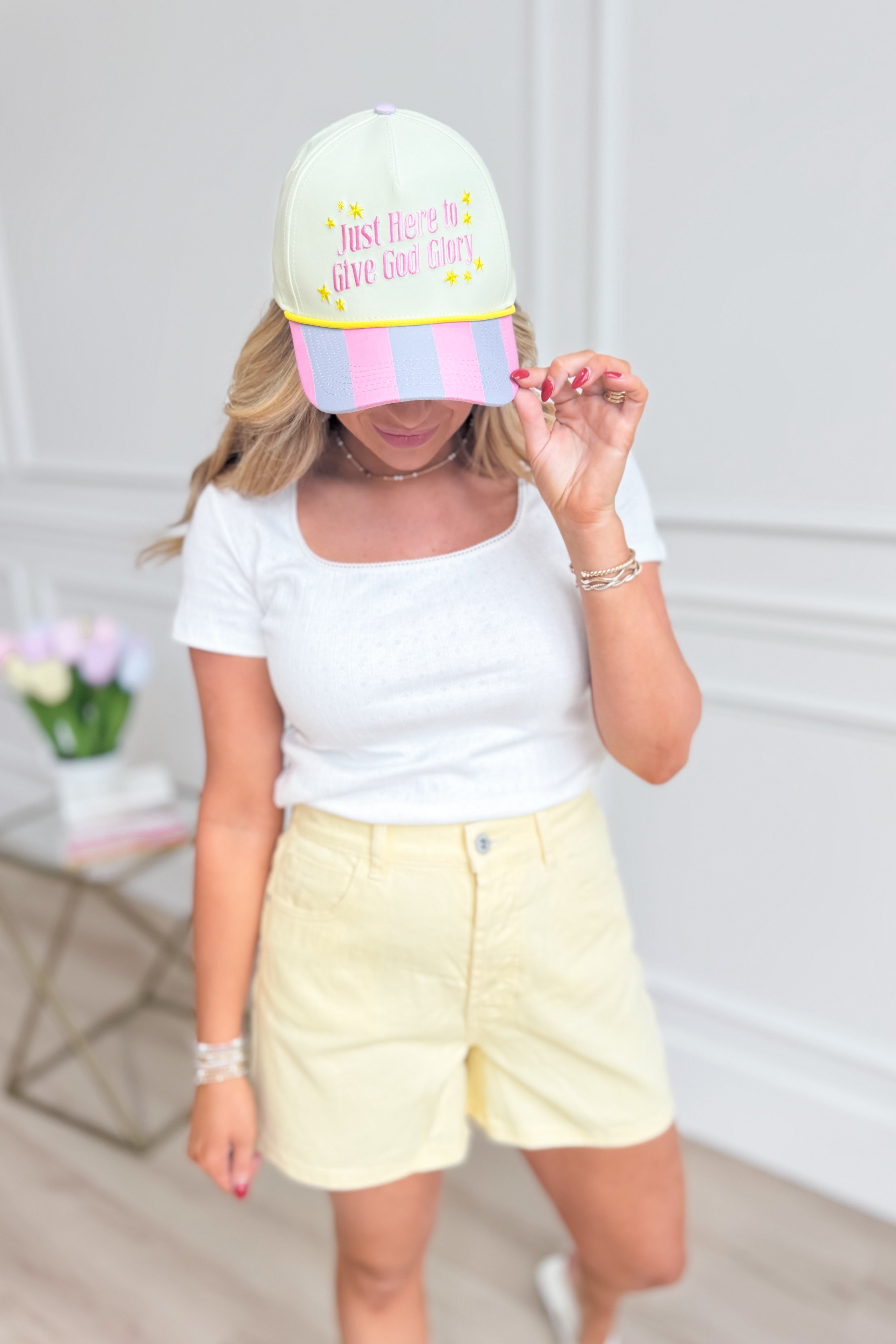 Give God Glory baseball hat by Taylor Elliot Designs, showcasing a stylish cap with embroidered message and adjustable strap.