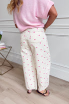 Pink polka dot barrel jeans from PEACH LOVE's 147 Novelty Jeans collection, featuring a stylish, vintage-inspired design.