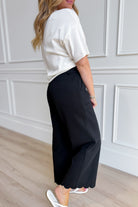 Jodifl Reis scallop trim wide-leg pants in lightweight fabric, featuring a relaxed fit and elegant scalloped hem detail.