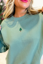 LE LIS Lynette Christmas Tree embroidered oversized sweatshirt featuring festive holiday graphic and cozy fit, black color.