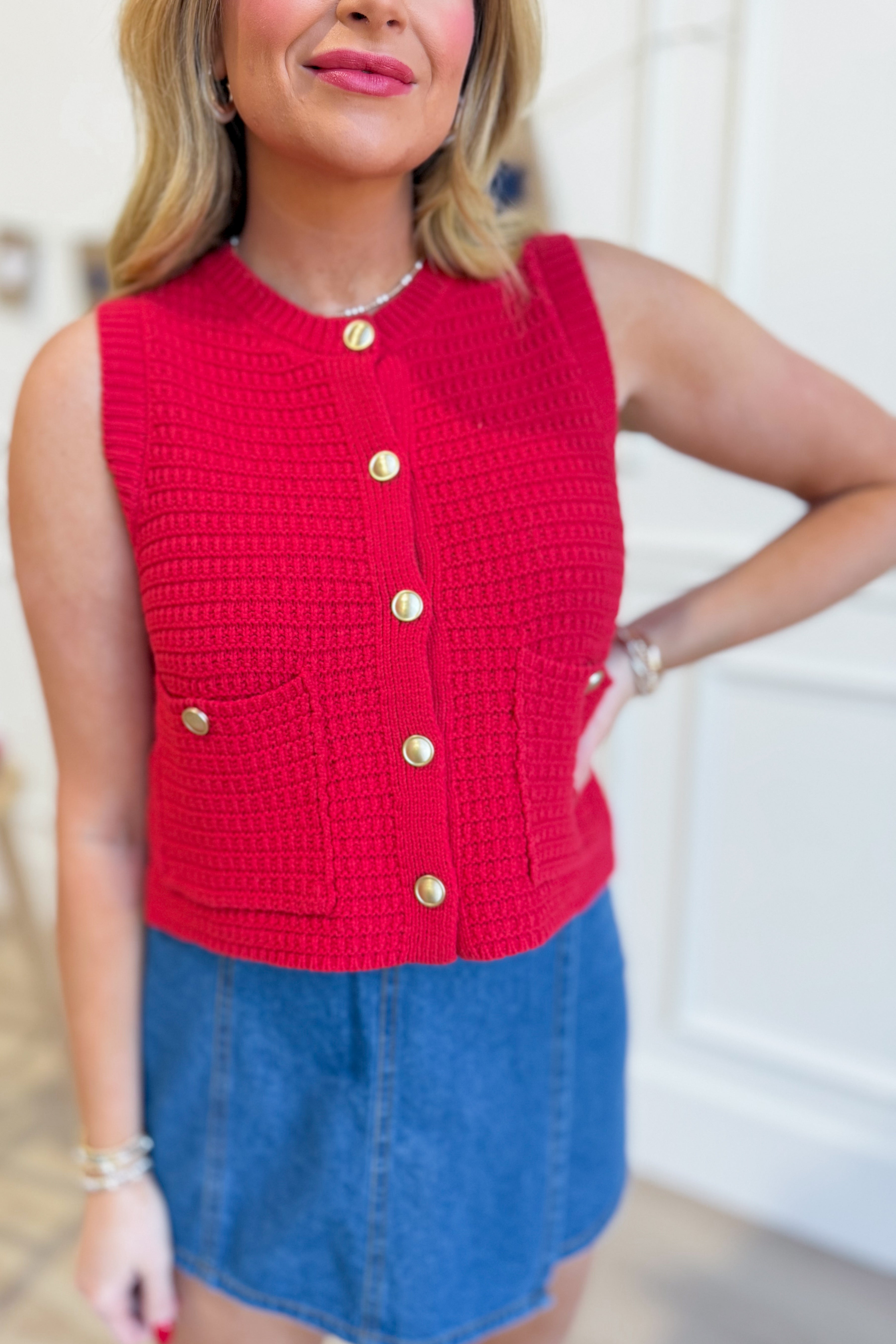 HYFVE Karigan knitted sleeveless vest, a stylish dressy top with a textured knit design, worn on a model.