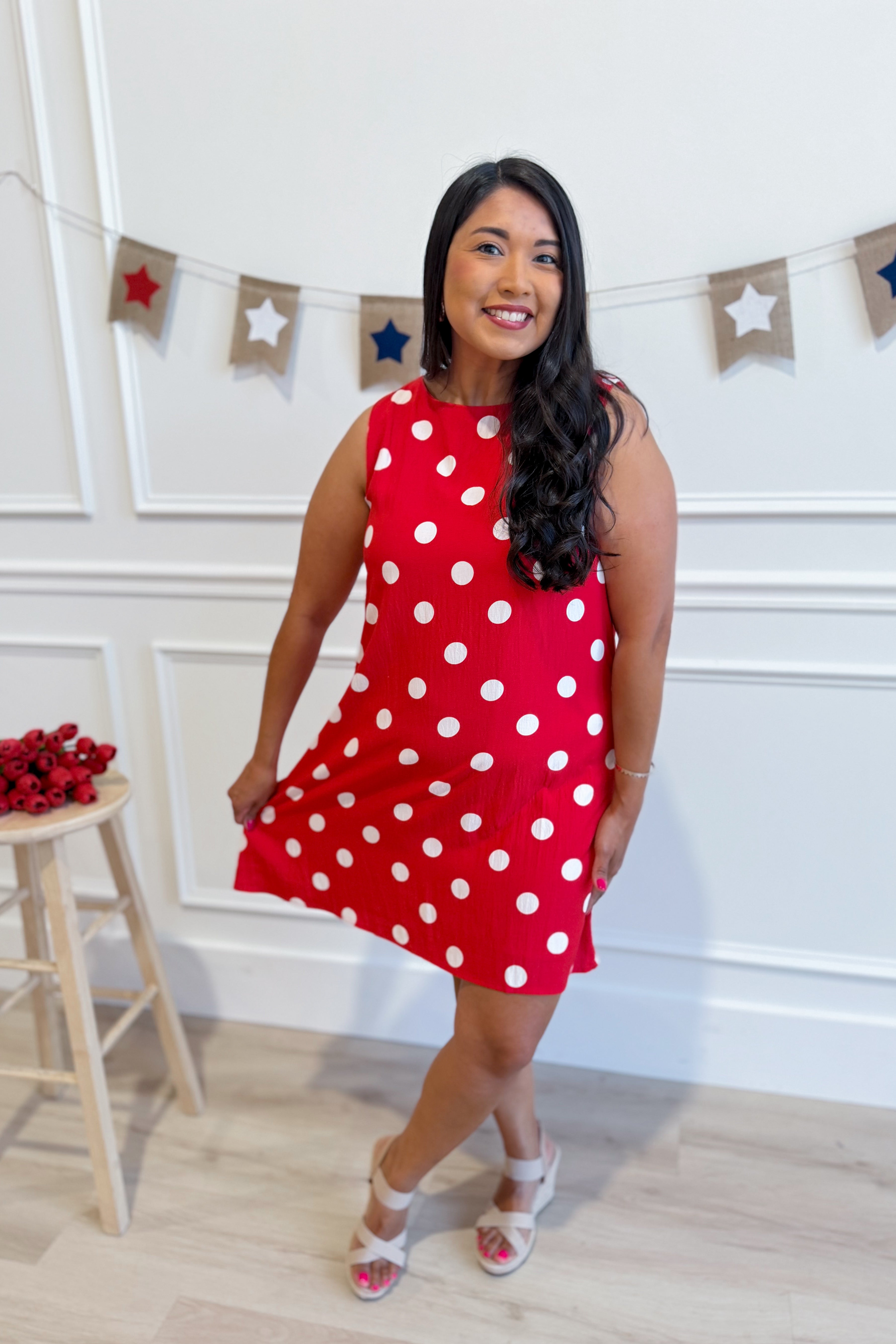 TCEC Gina polka dot print sleeveless shift dress with a relaxed fit, featuring a classic polka dot pattern and casual style.