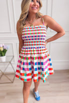 Checkered Frita smocked bodice casual dress by TCEC, featuring a relaxed fit and stylish pattern perfect for warm weather.
