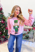 PEACH LOVE Minnie Nutcracker printed pullover sweatshirt with festive graphic design