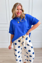 Collins Cobalt Blue Solid Casual Sweater by SHE + SKY, featuring a cozy knit design in vibrant cobalt blue.