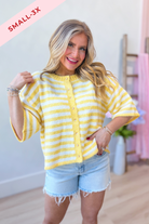 Lauren yellow striped button-down cardigan top from BAEVELY, a 131 spring sweater with bright yellow and white stripes.