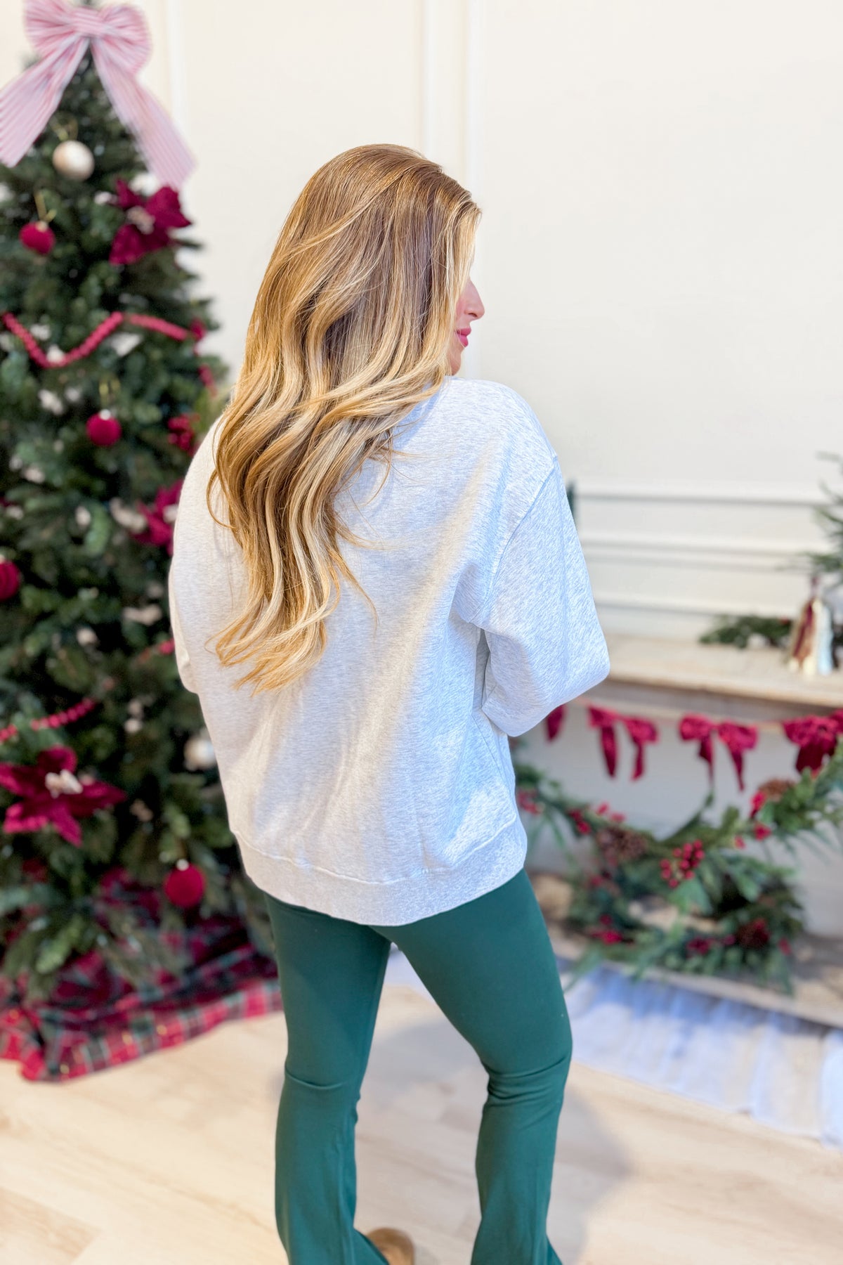 Everleigh Merry multi-colored graphic sweatshirt by TWENTIFOURTH, featuring vibrant design and cozy pullover style.