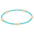 Enewton turquoise hope purpose gold bracelet with a sleek design, featuring a turquoise stone and gold accents.