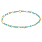 Enewton Spring Summer Hope Joy bracelet with colorful beads and charm on a white background.