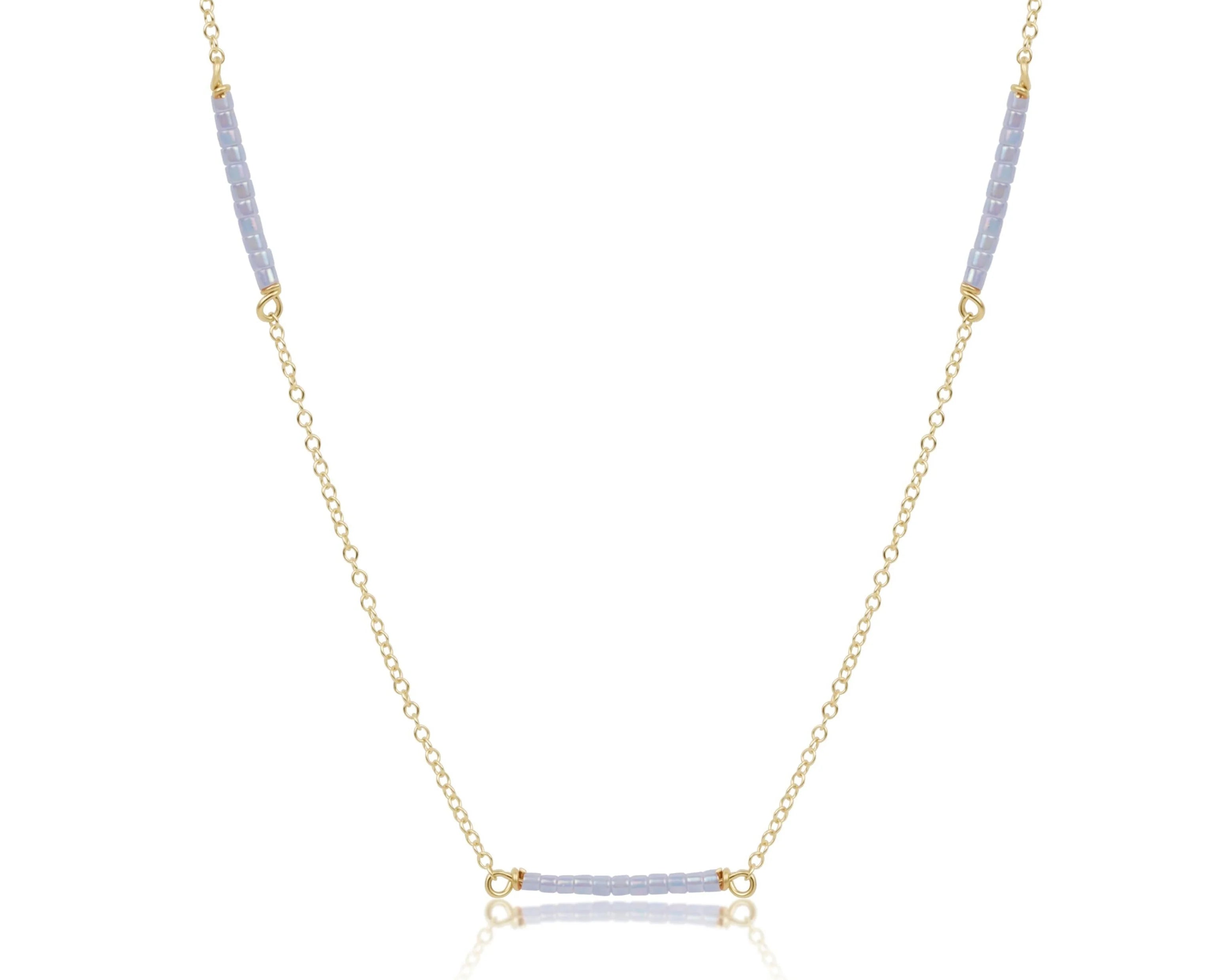 Enewton gold chain necklace featuring ocean mist hope bliss design, elegant jewelry piece with intricate chain details.
