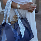 Navy Case Mate Jelly Tote bag with twist handle and see-through design, showcasing a stylish accessory for everyday use.