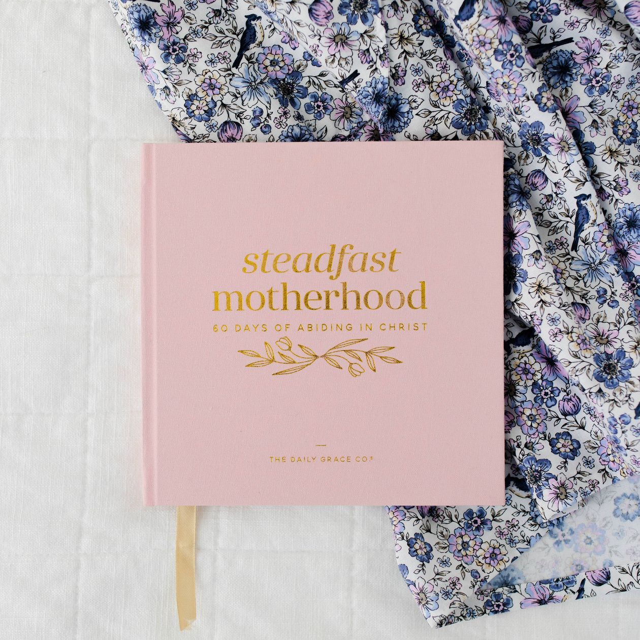 Decorative home accessory featuring inspiring "Steadfast Motherhood" message from THE DAILY GRACE CO for 60 days of spiritual reflection.