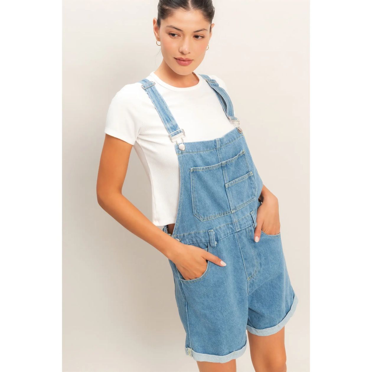 HYFVE Carrie denim cross back overalls from the 153 Rompers collection, featuring a stylish denim design with cross back straps.