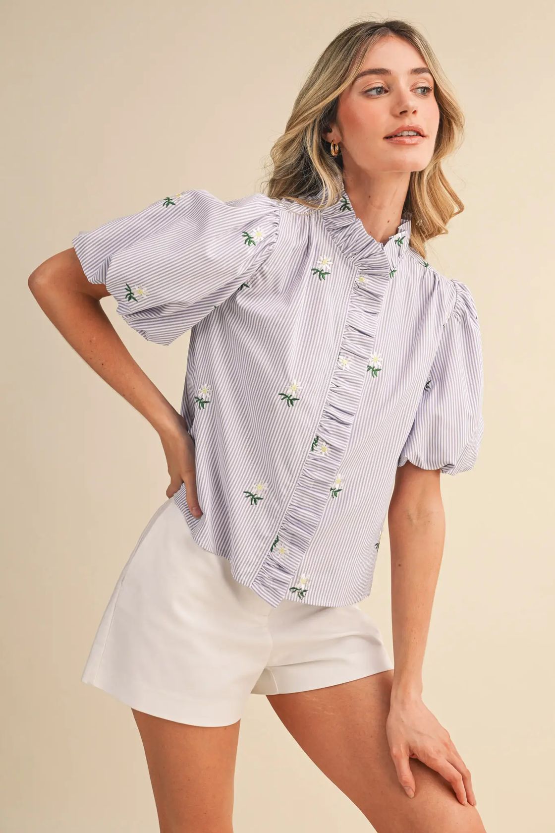 &MERCI Denna floral embroidery striped ruffled button-down top, stylish dressy blouse with floral details and ruffles.